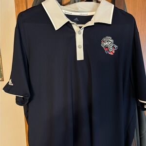 Navy blue Adidas polo. Rocket City Trash Panda embroidered.